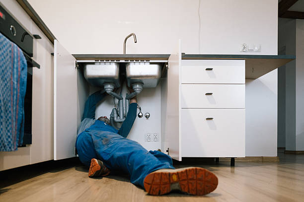 Professional Drain Cleaning technician working in Urbandale, IA